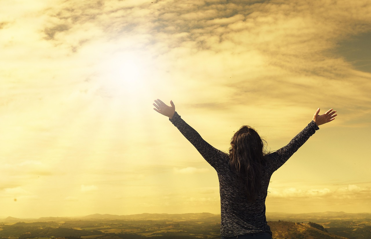 woman, sky, sunlight, arms, open arms, sunbeams, sunrays, clouds, worship, freedom, nature, happiness, relieved, prayer, praise, success, joy